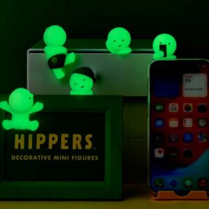 Glowing Hippers decorative mini figures with smartphone and display, ideal for tech and desk decor enthusiasts.