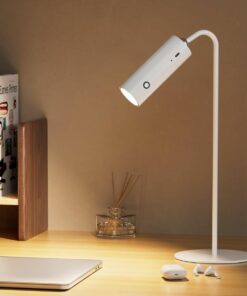 Modern white LED desk lamp illuminating workspace with sleek design for efficient task lighting. Ideal for home offices.