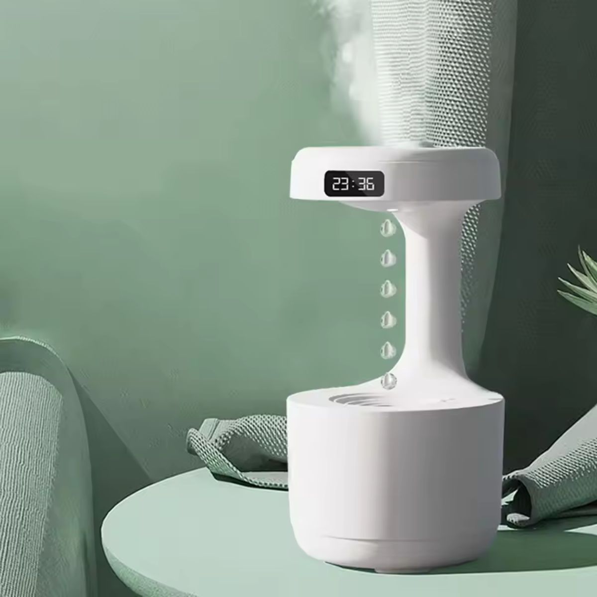 Anti-Gravity Water Drop Humidifier with LED Clock & Silent Mist Spray 1 Anti-Gravity Water Drop Humidifier clock with water drip design, perfect for home decor and air moisture control.