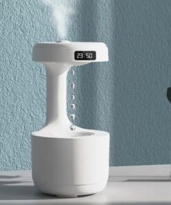 Anti-Gravity Water Drop Humidifier with digital clock, minimalist design for improved air quality and ambiance.