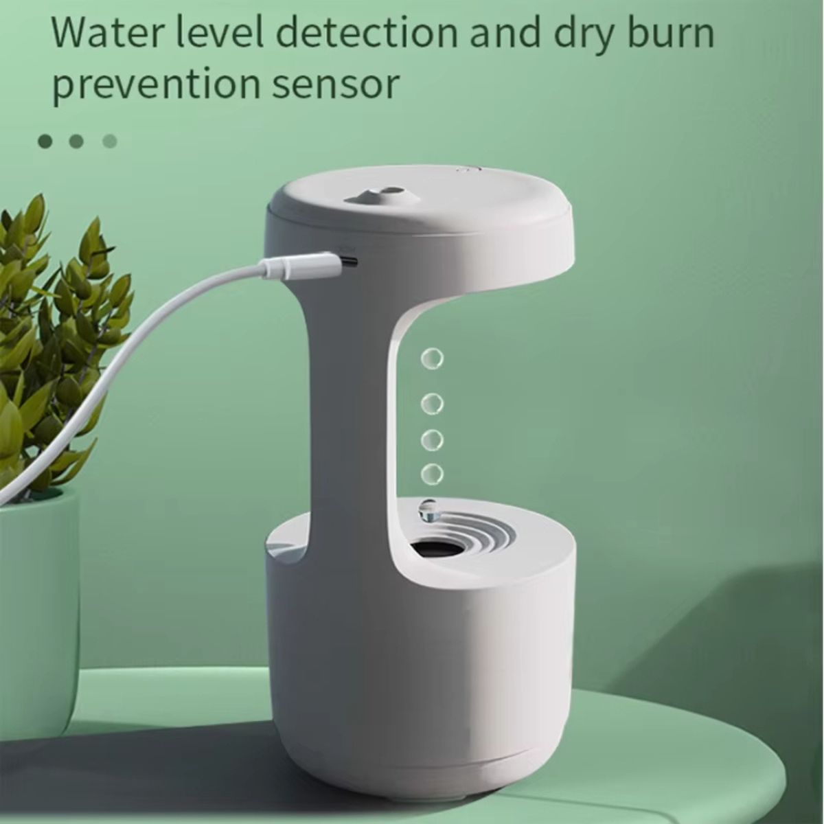 Anti-Gravity Water Drop Humidifier with LED Clock & Silent Mist Spray 5 Anti-Gravity Water Drop Humidifier with water level detection and dry burn prevention sensor.