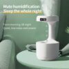 Anti-Gravity Water Drop Humidifier with digital display for restful sleep and continuous air moisture control.
