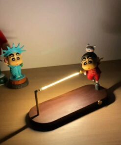 Whimsical desk lamp with cartoon character design and wooden base for playful home decor lighting.